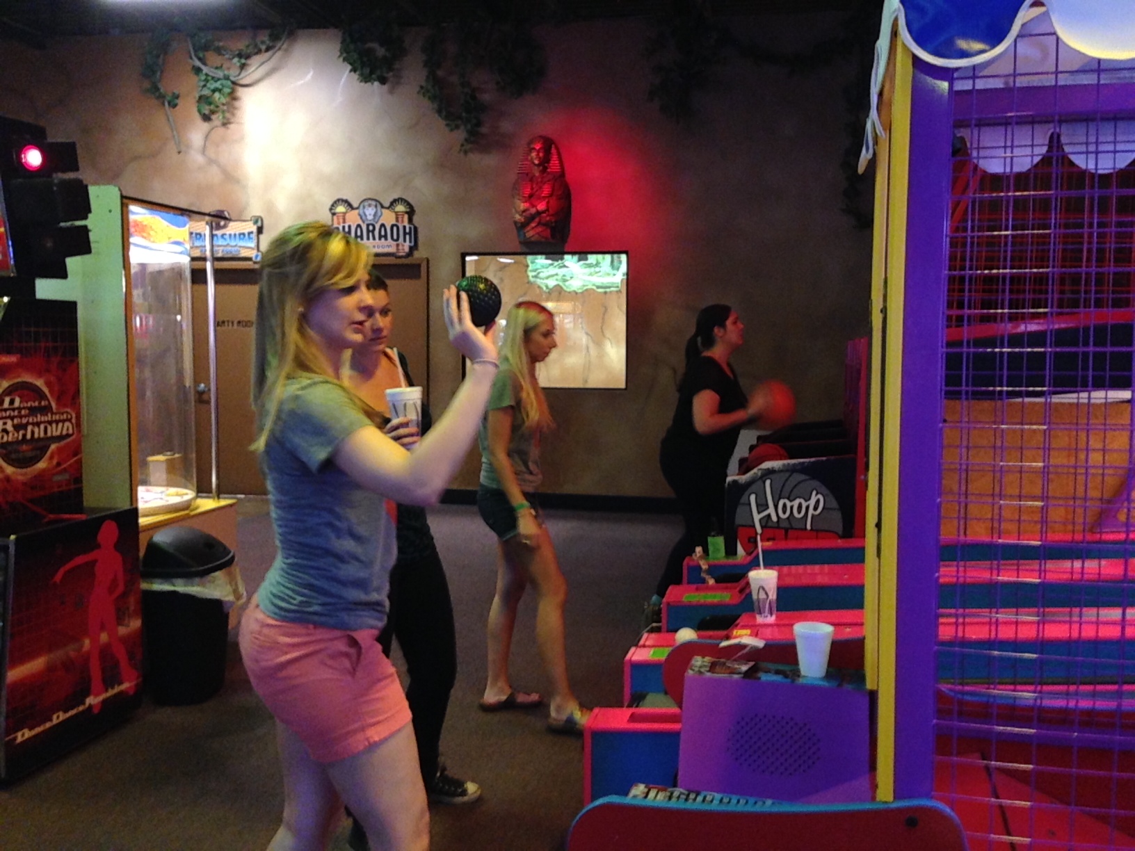 Alison mastering skee-ball.