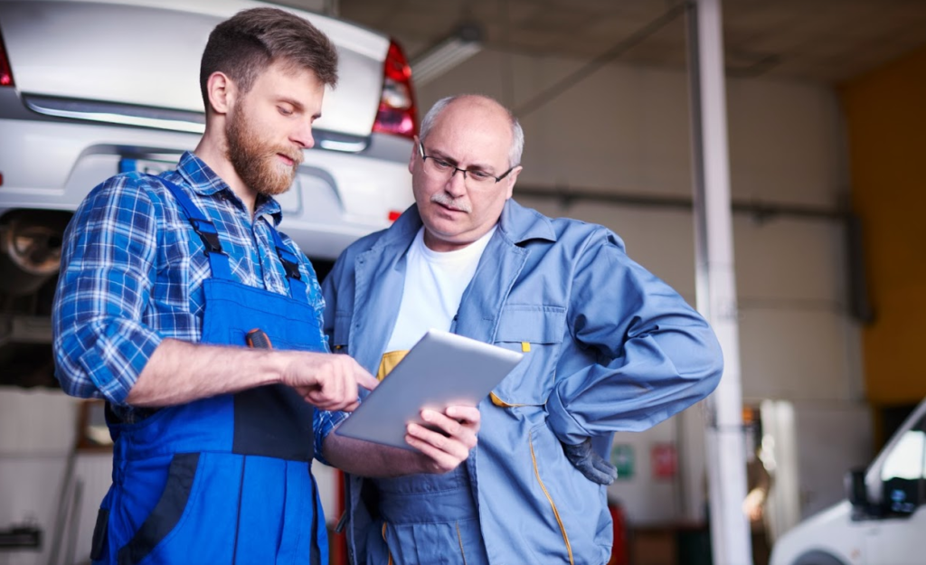 Two business owners making edits to their Google My Business listing as instructed by Search Influence in New Orleans, LA